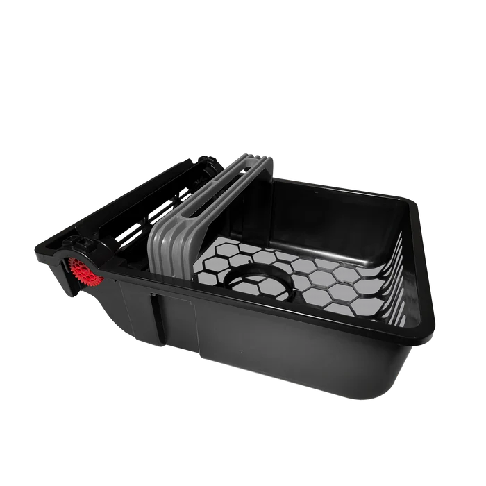 Betta SE Plus robotic pool skimmer debris collection basket with ergonomic handle design.